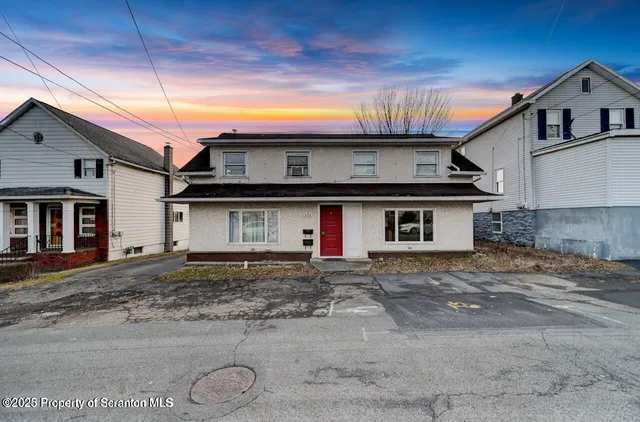a house view with a outdoor space