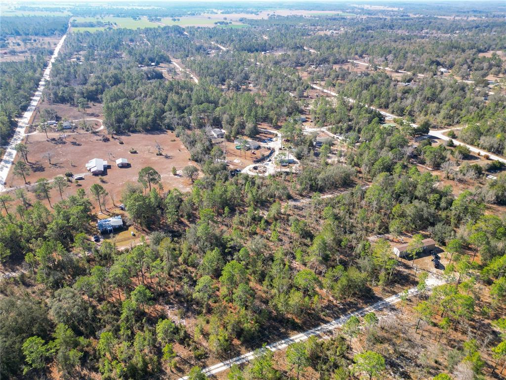 Tbd Northeast 58th Street Bronson, FL 32621 - Photo 14 of 22 an aerial view of house with yard and mountain view in back
