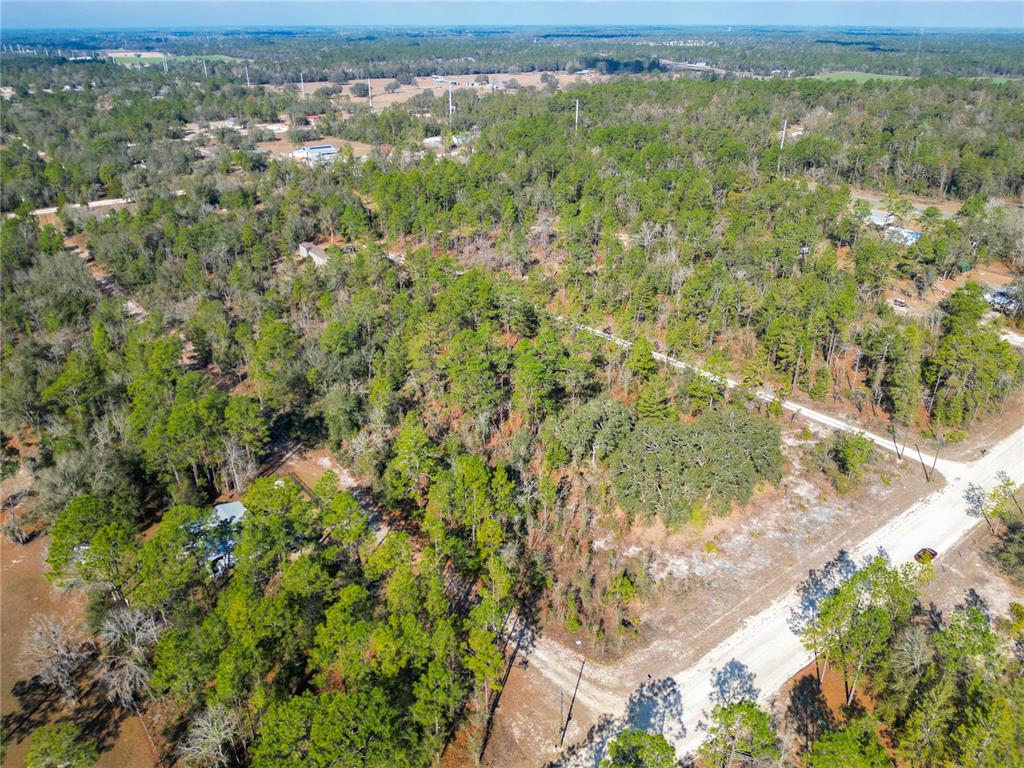 Tbd Northeast 58th Street Bronson, FL 32621 - Photo 18 of 22 a view of a yard with an outdoor space