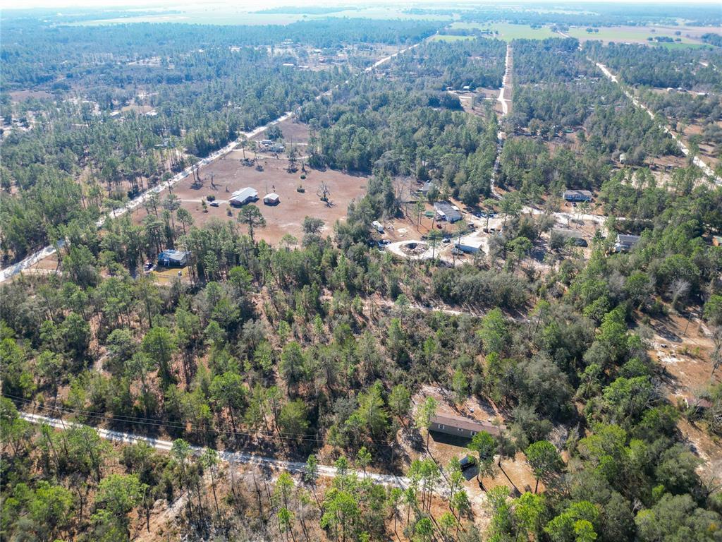 Tbd Northeast 58th Street Bronson, FL 32621 - Photo 7 of 22 an aerial view of a city with lots of residential buildings