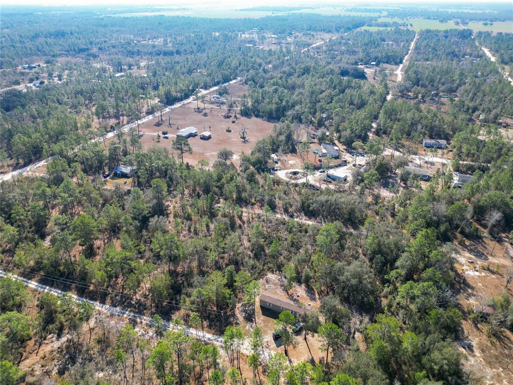 Tbd Northeast 58th Street Bronson, FL 32621 - Photo 8 of 22 an aerial view of house with yard and mountain view in back