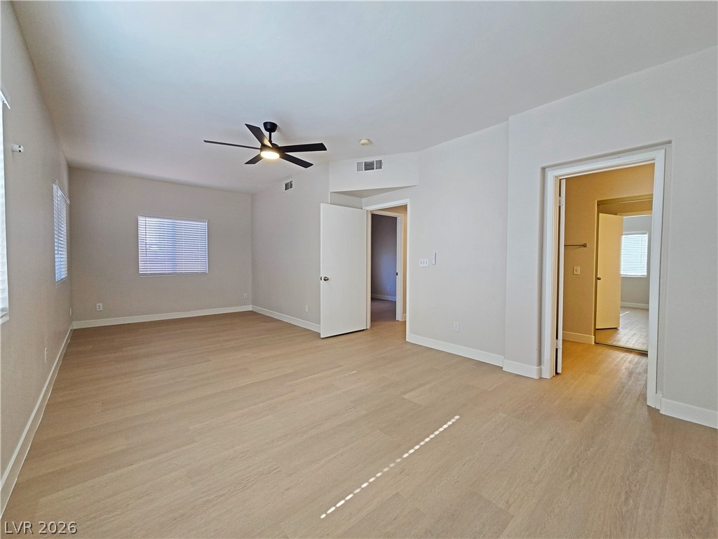 5370 Runningbrook Road Las Vegas, NV 89120 - Photo 19 of 30 Ample floor space and well-lit windows create a versatile and inviting atmosphere.