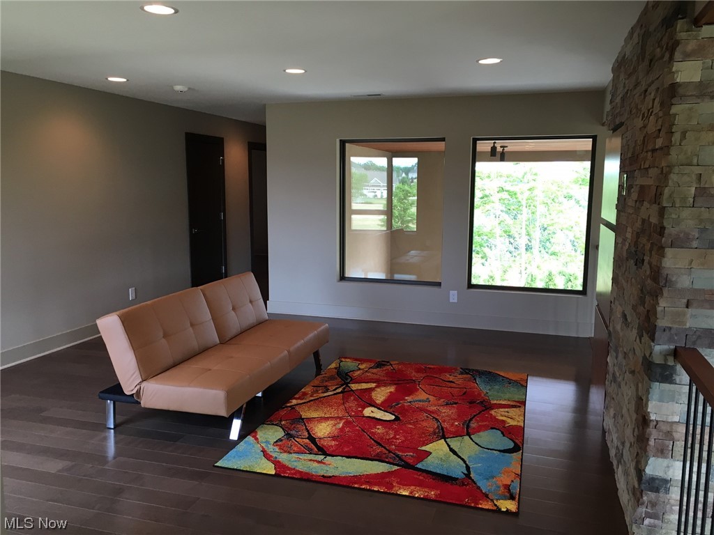2300 Rivers Edge Drive Willoughby, OH 44094 - Photo 16 of 29 Second Floor Loft Area with stone wall accents looking over the Great Room