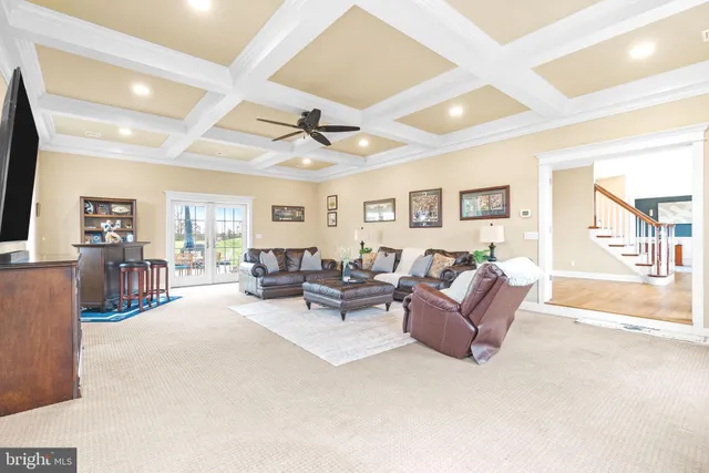 a living room with furniture fireplace and flat screen tv