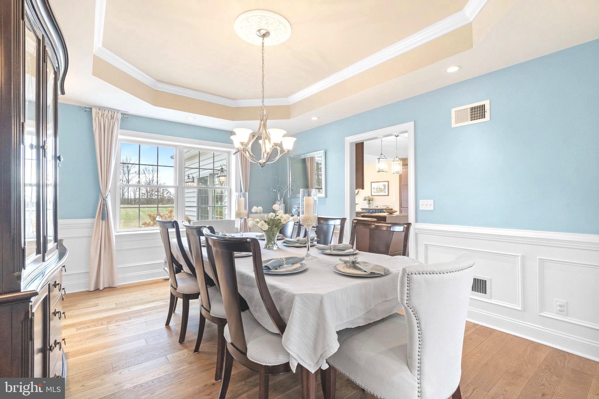 3320 Fisher Road Lansdale, PA 19446 - Photo 18 of 65 a view of a dining room with furniture wooden floor and chandelier