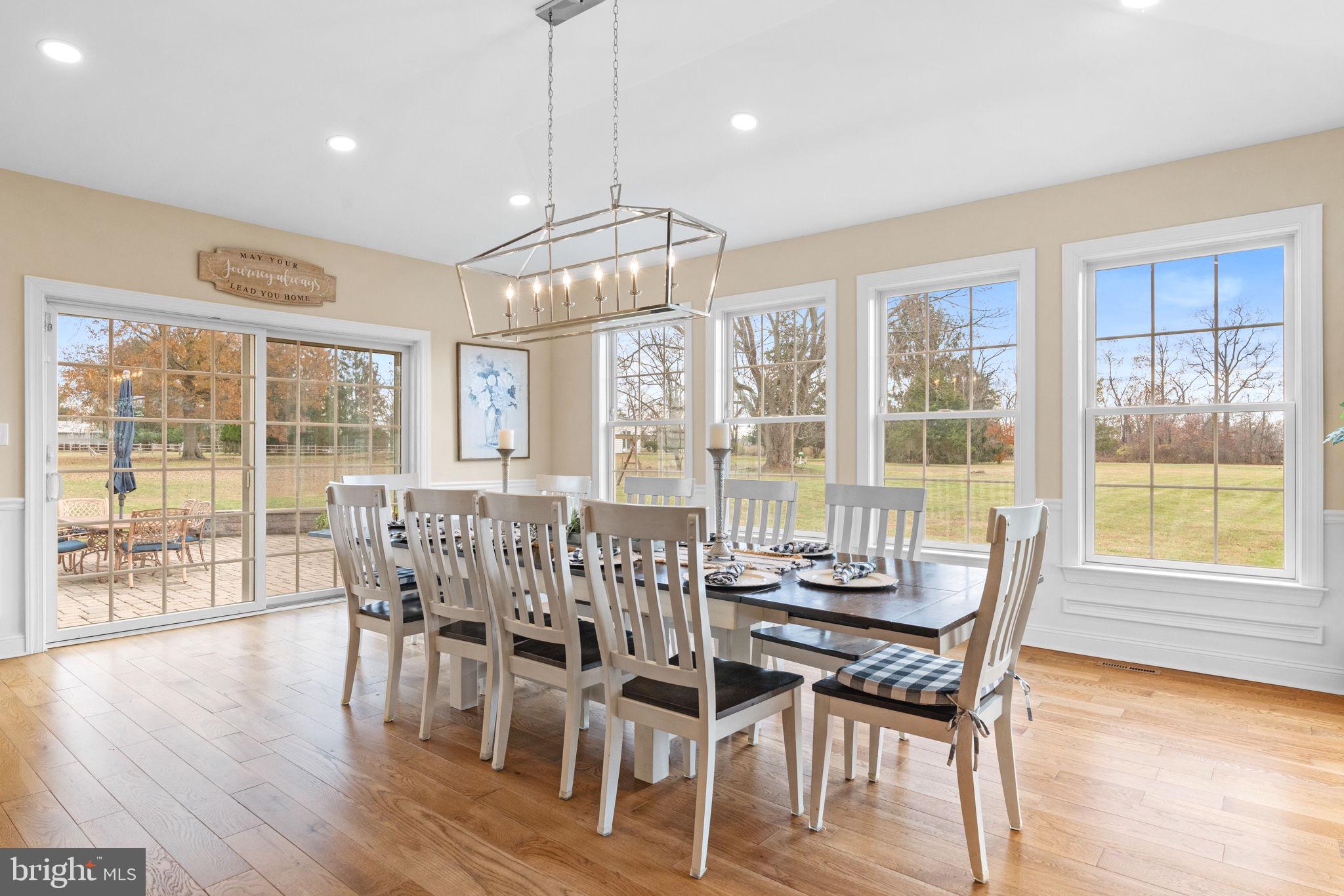 3320 Fisher Road Lansdale, PA 19446 - Photo 24 of 65 a view of a dining room with furniture wooden floor and chandelier