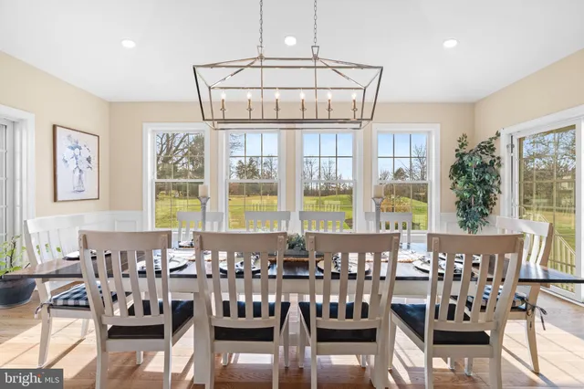 a bedroom with a bed and a television