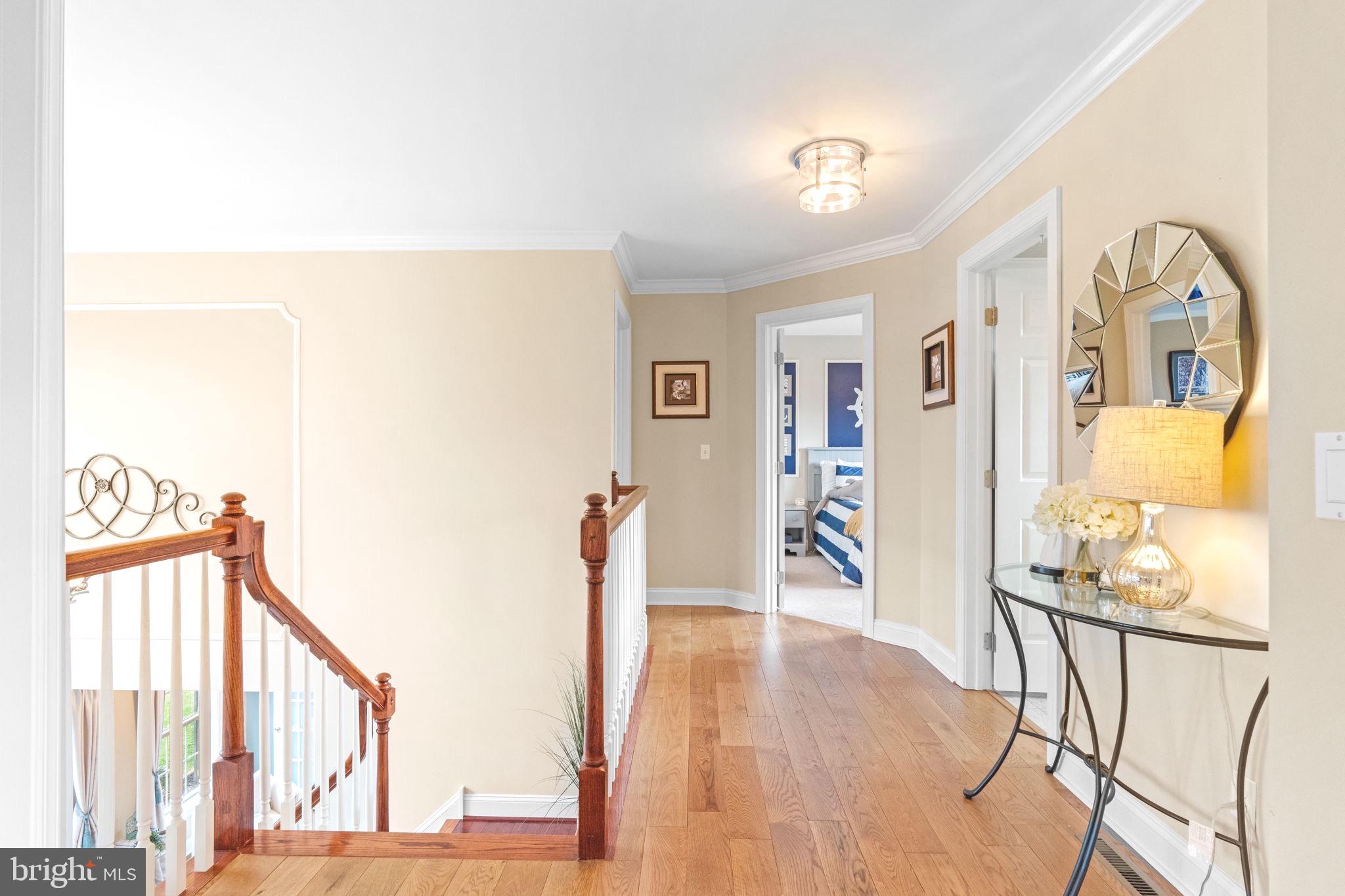 3320 Fisher Road Lansdale, PA 19446 - Photo 35 of 65 a view of a hallway with wooden floor and furniture