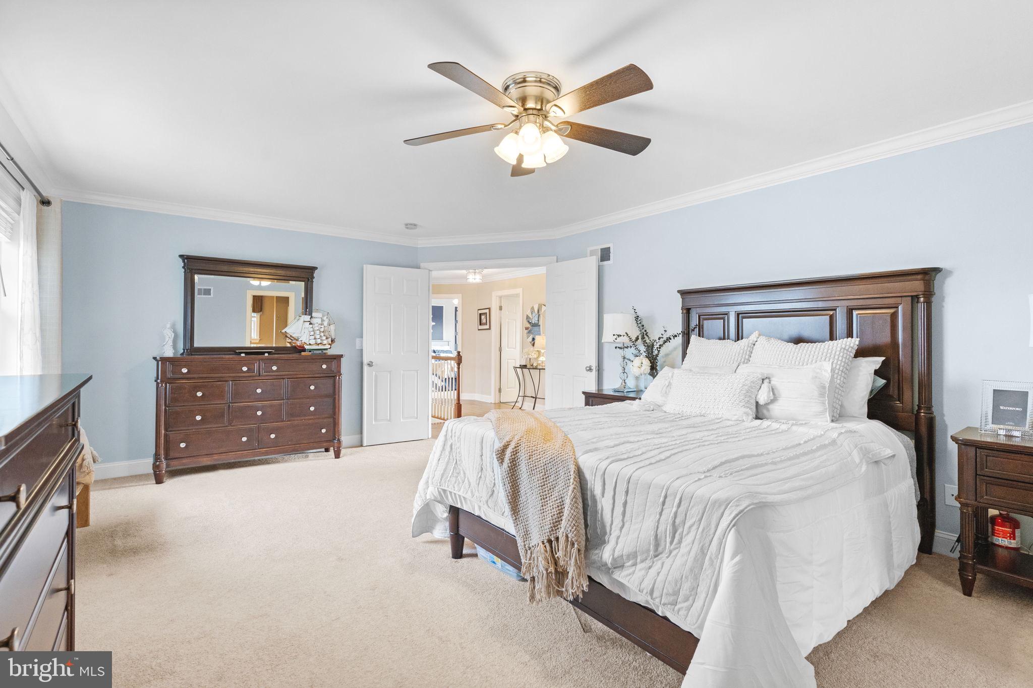 3320 Fisher Road Lansdale, PA 19446 - Photo 38 of 65 a bedroom with a bed and a chandelier