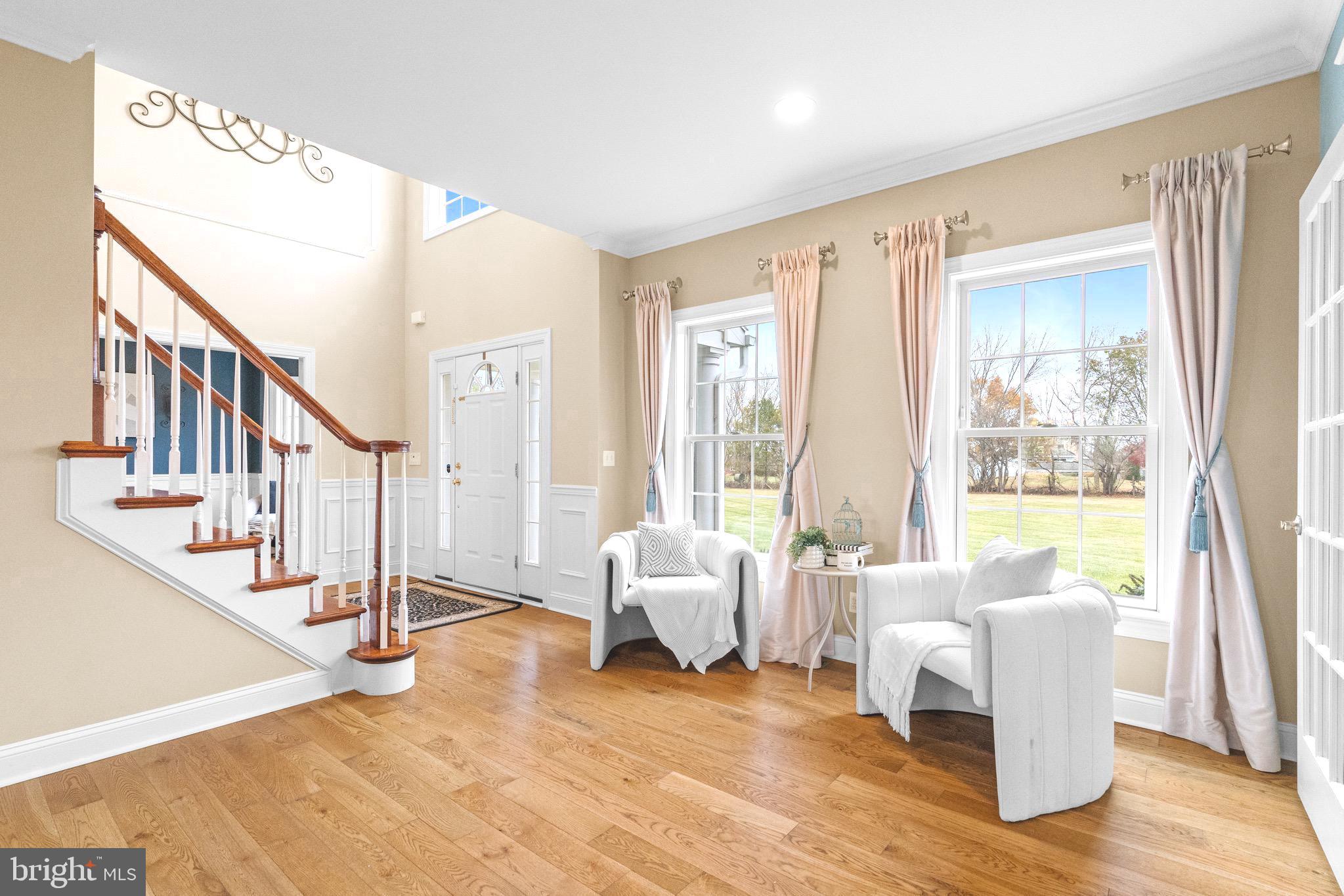 3320 Fisher Road Lansdale, PA 19446 - Photo 9 of 65 a living room with furniture and wooden floor next to a window