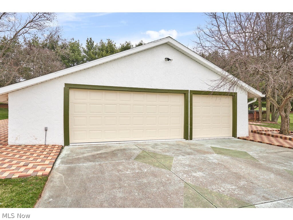 1553 South Hametown Road Akron, OH 44321 - Photo 29 of 34 This home has a 3 car side load garage