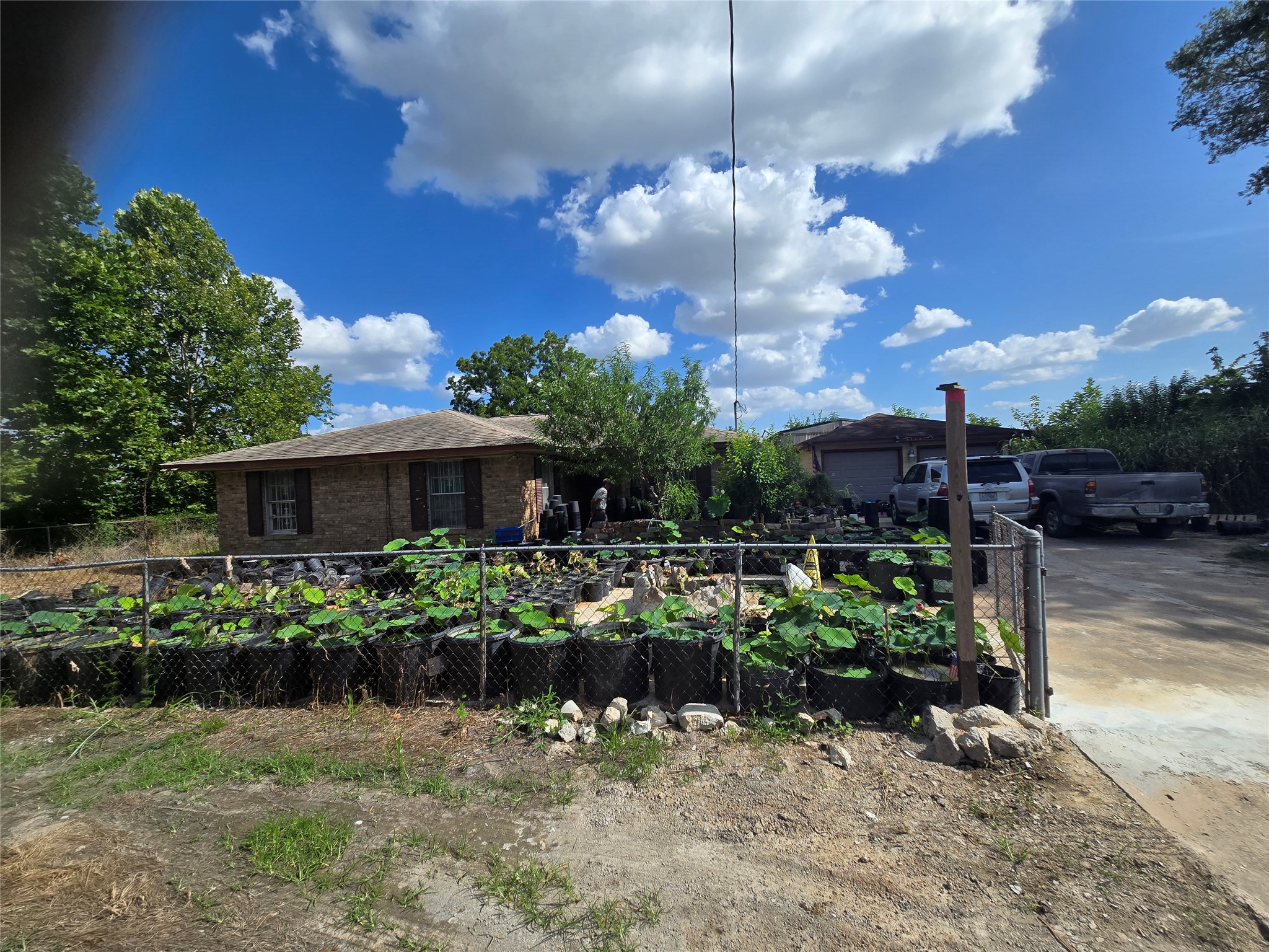6713 Breen Drive Houston, TX 77086 - Photo 2 of 21 a view of a house with a yard
