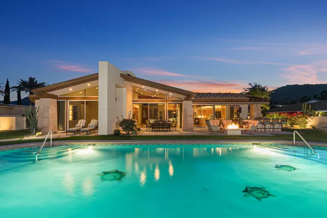 a view of a house with a swimming pool