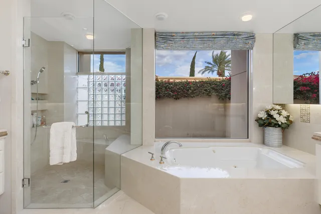 a bath tub sitting next to a bathroom