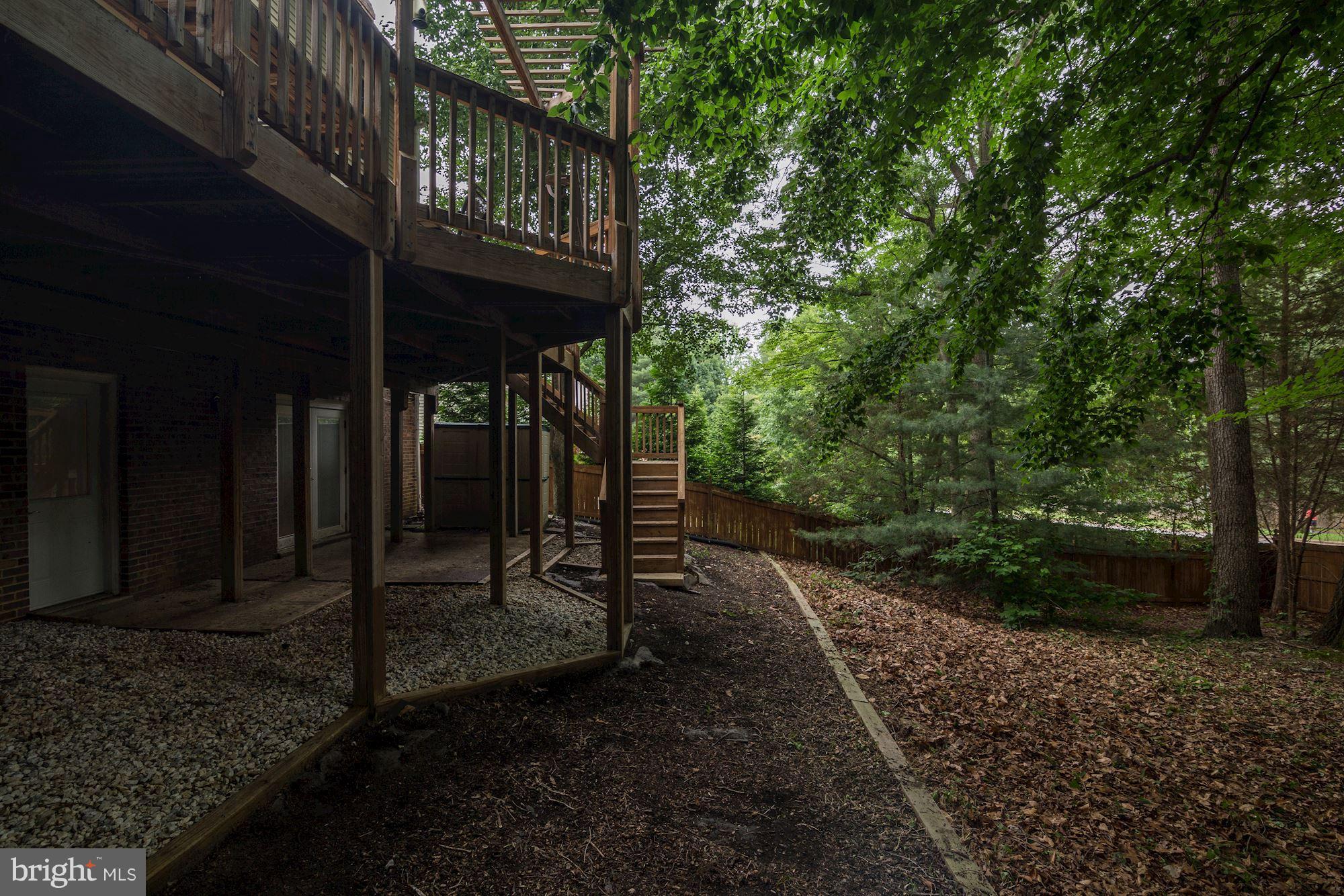 7317 Jenna Road Springfield, VA 22153 - Photo 30 of 30 Large fenced backyard with trees