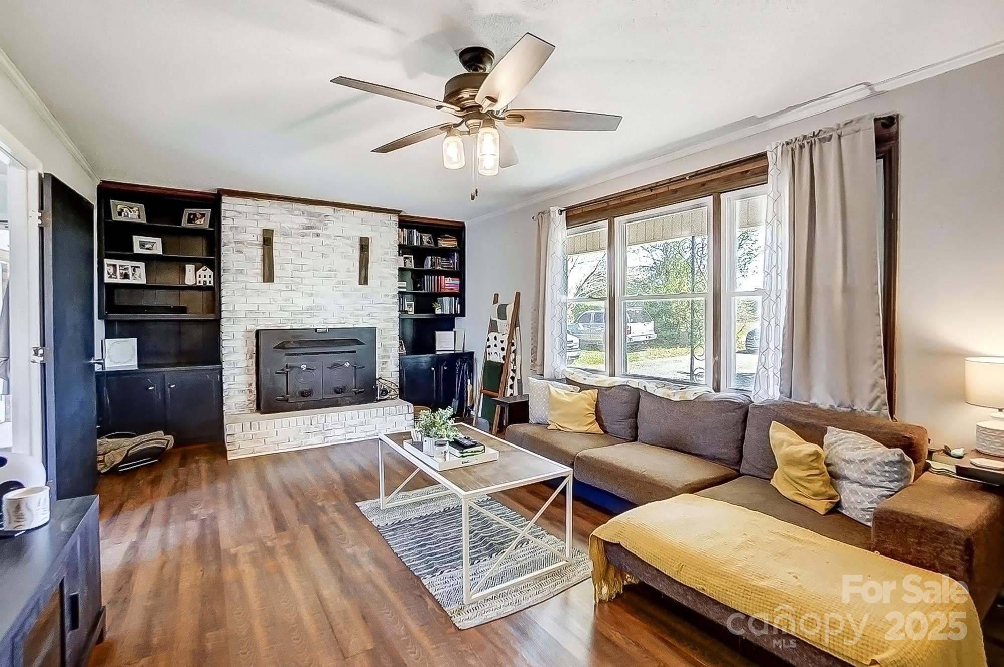 976 Pointview Lane Lincolnton, NC 28092 - Photo 11 of 43 a living room with furniture and a fireplace