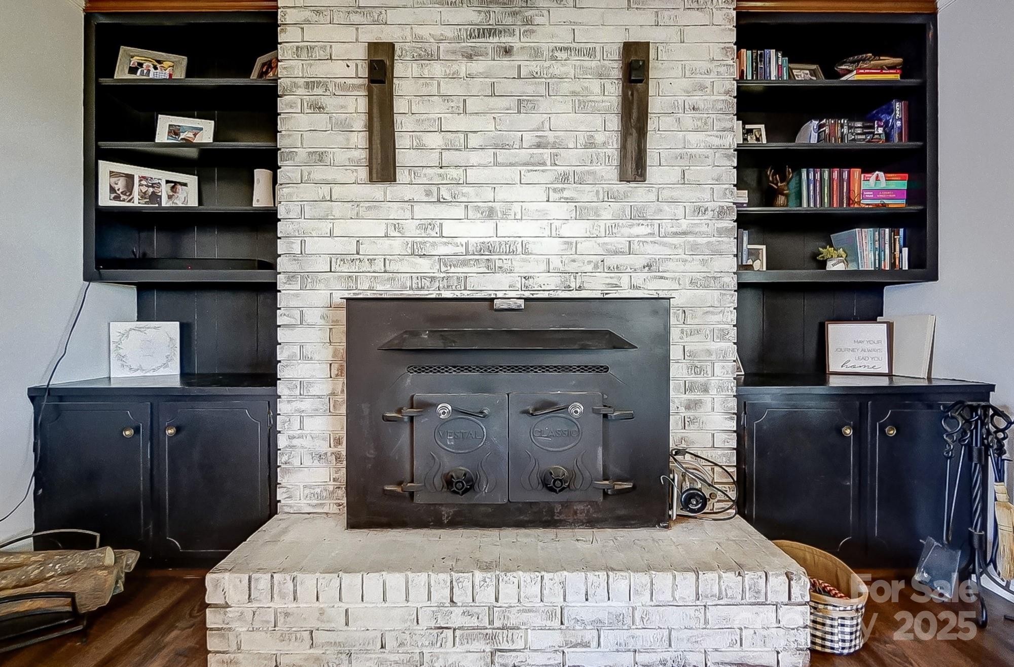 976 Pointview Lane Lincolnton, NC 28092 - Photo 12 of 43 a bedroom with a bed and a fireplace