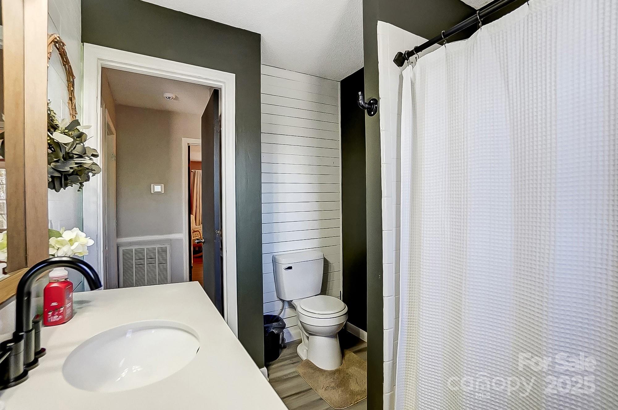 976 Pointview Lane Lincolnton, NC 28092 - Photo 27 of 43 a bathroom with a sink toilet and shower
