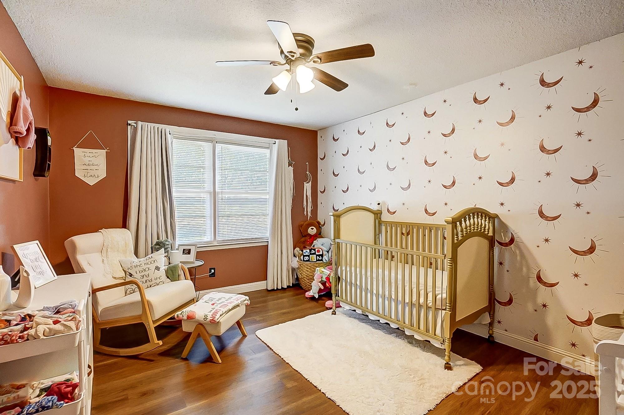 976 Pointview Lane Lincolnton, NC 28092 - Photo 29 of 43 a bedroom with furniture and wooden floor