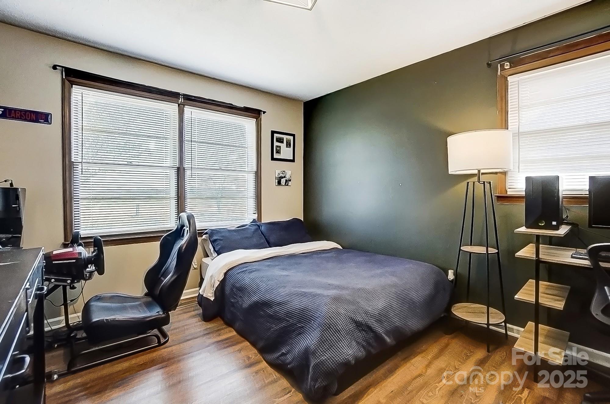 976 Pointview Lane Lincolnton, NC 28092 - Photo 32 of 43 a bedroom with a bed and wooden floor
