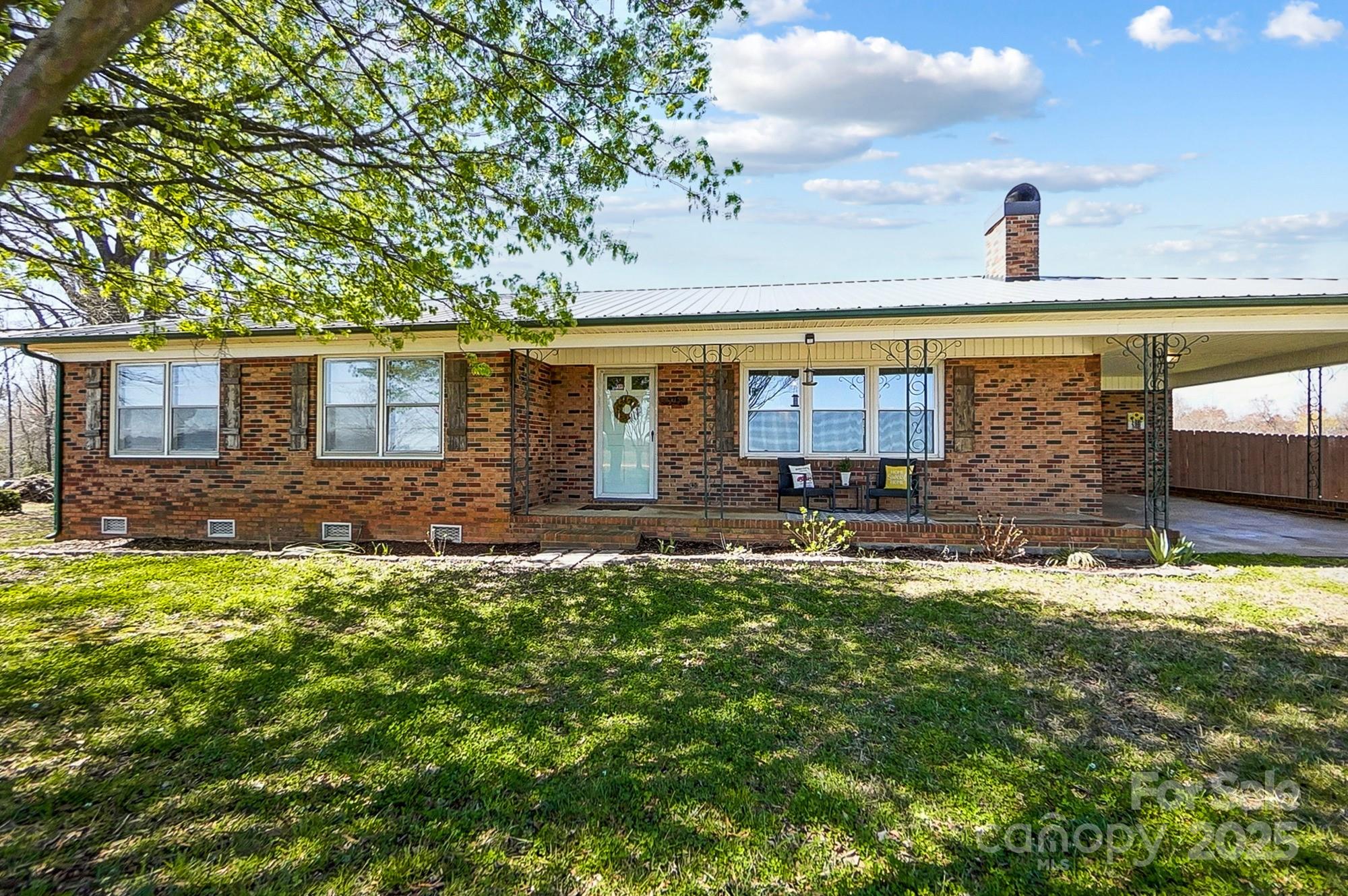 976 Pointview Lane Lincolnton, NC 28092 - Photo 4 of 43 a front view of a house with a yard