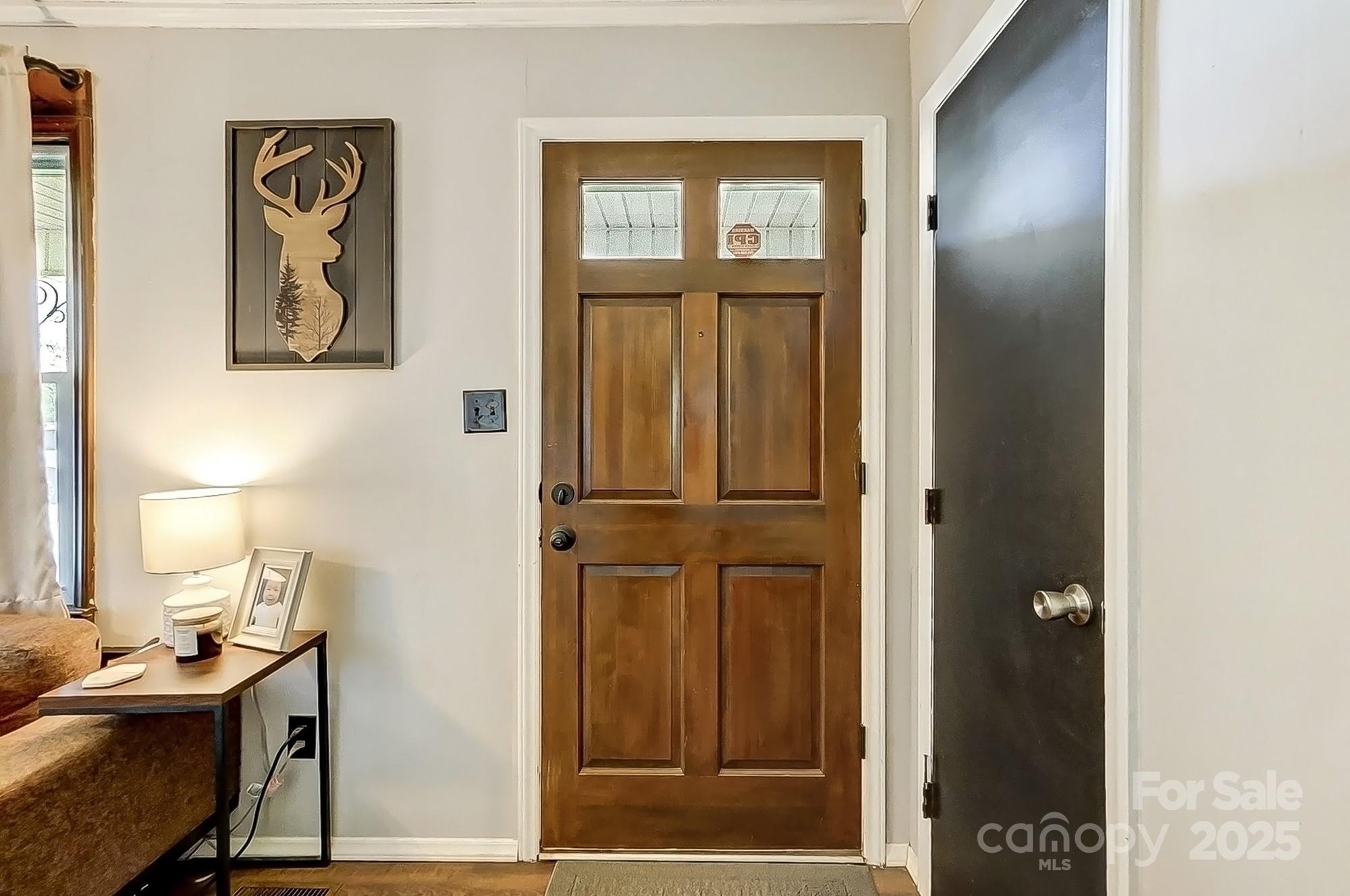 976 Pointview Lane Lincolnton, NC 28092 - Photo 8 of 43 a view of a hallway with workspace