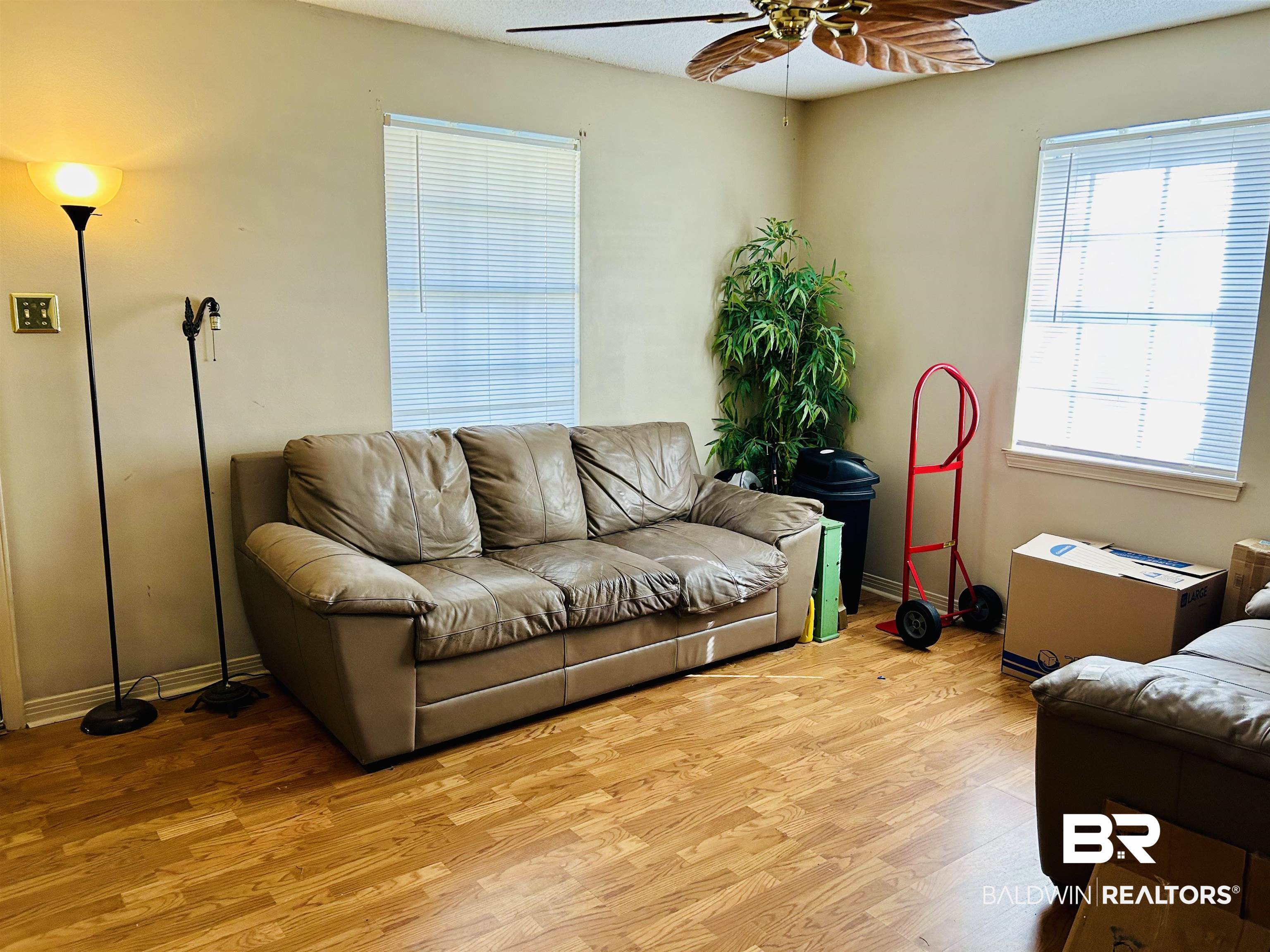 5925 Dixie Lane Mobile, AL 36693 - Photo 3 of 19 Living room featuring ceiling fan and light hardwood / wood-style floors