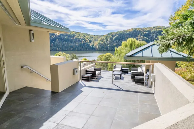 a bathroom with a tub a sink and a shower
