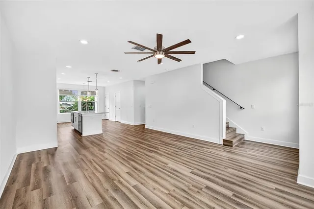 a bathroom with a sink a mirror and a window