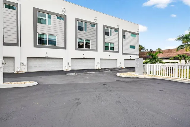 a view of building with yard