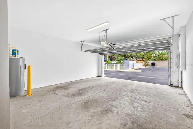 an aerial view of house with yard