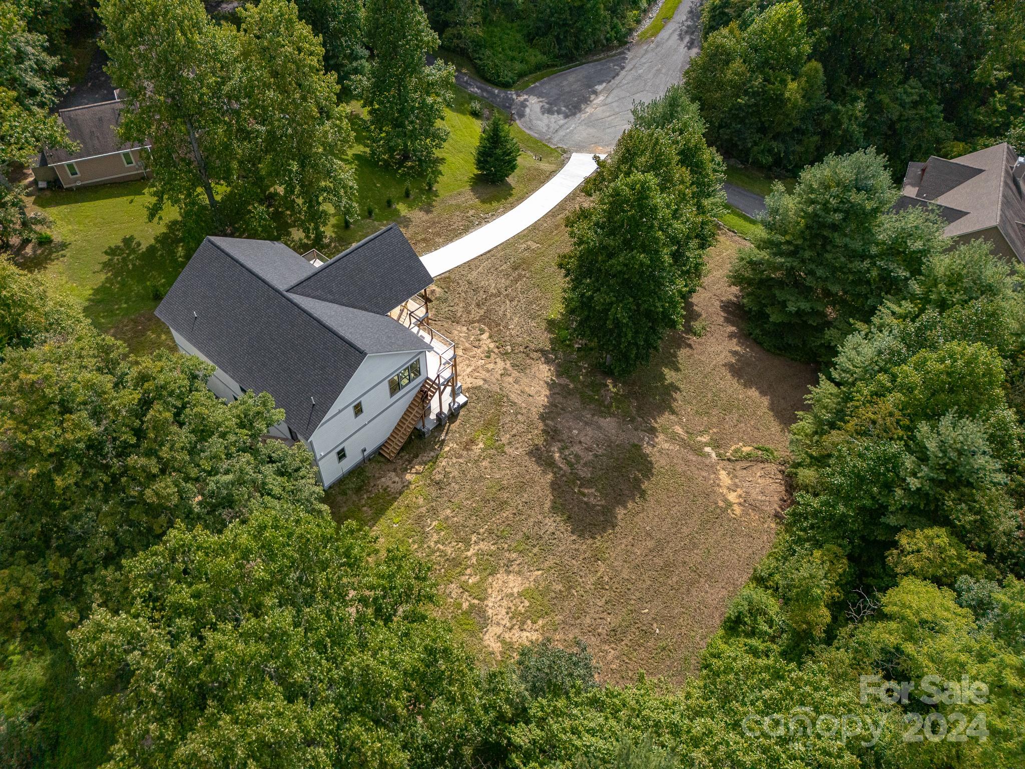 171 Tatham Road Hendersonville, NC 28792 - Photo 14 of 19 an aerial view of a house with a yard