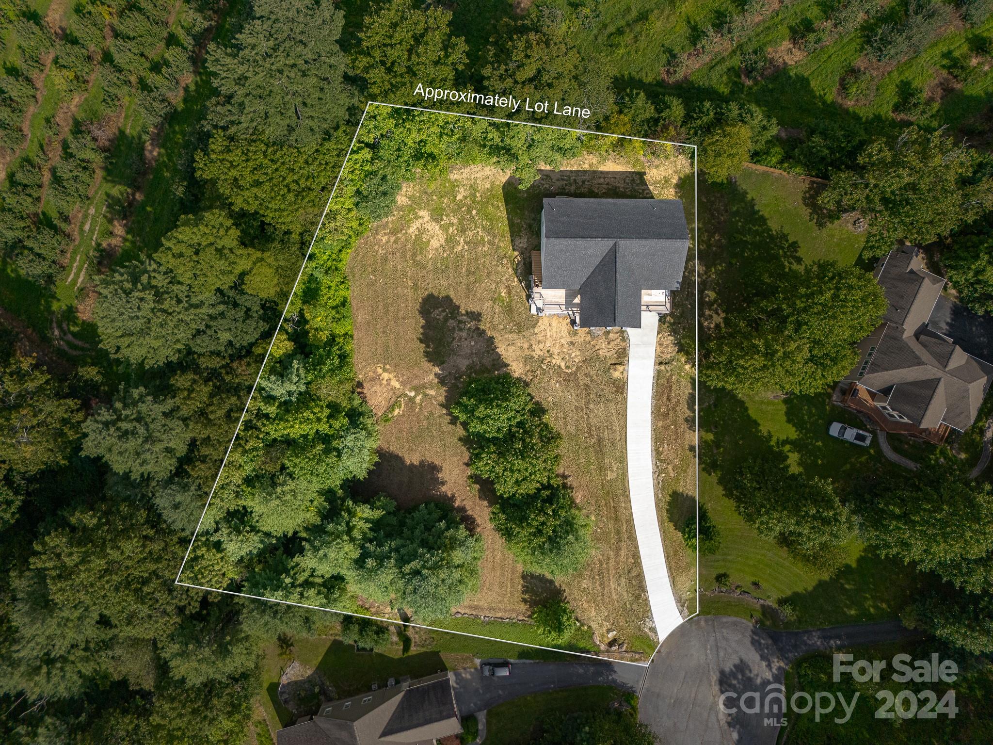 171 Tatham Road Hendersonville, NC 28792 - Photo 5 of 19 an aerial view of a house with a yard