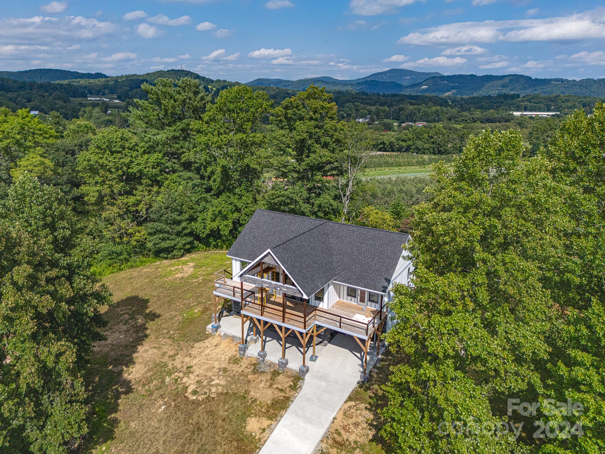171 Tatham Road Hendersonville, NC 28792 - Photo 10 of 19 an aerial view of a house with a yard