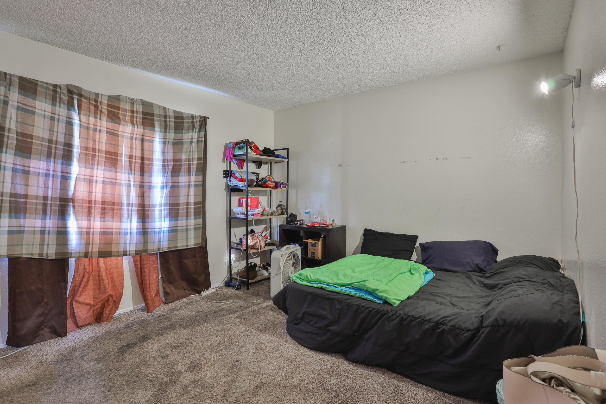 464 Riverside Avenue Rialto, CA 92376 - Photo 29 of 33 a living room with a couch and a couch