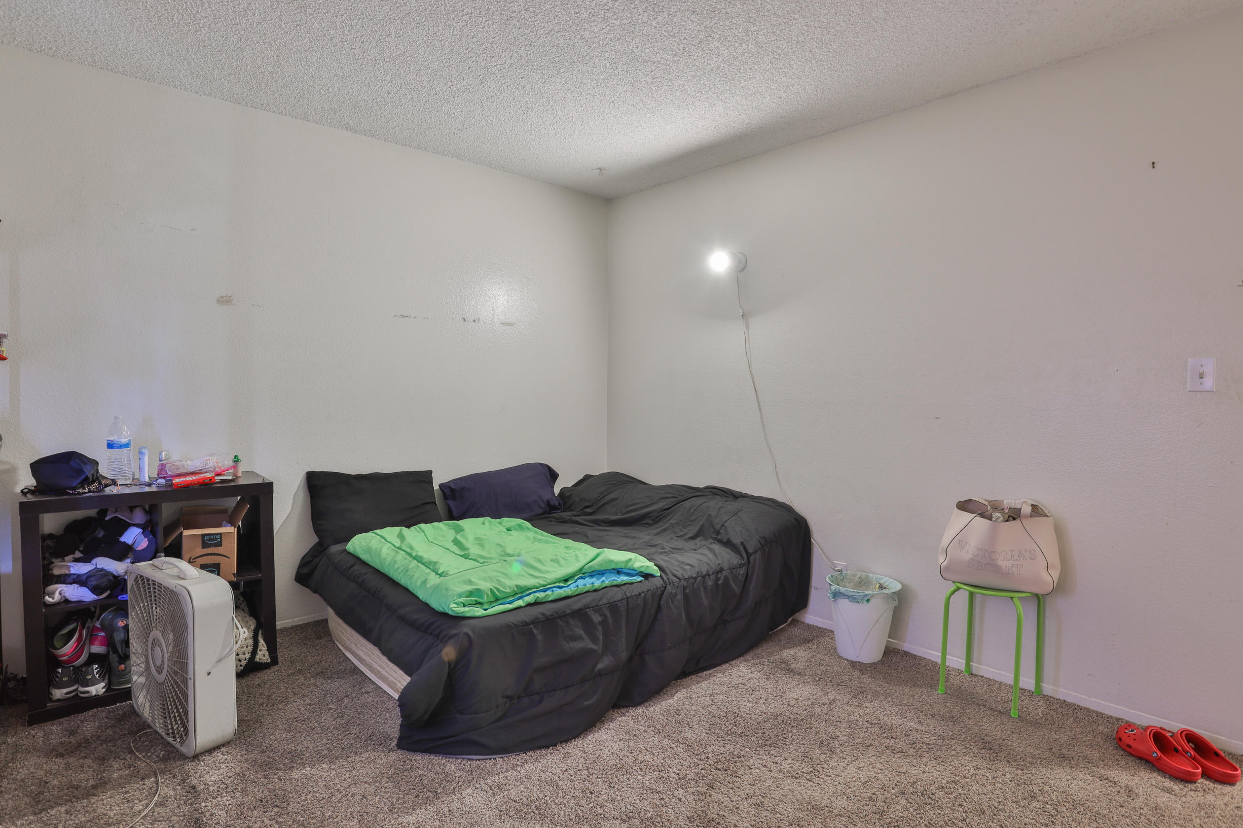 464 Riverside Avenue Rialto, CA 92376 - Photo 30 of 33 a living room with furniture and a couch