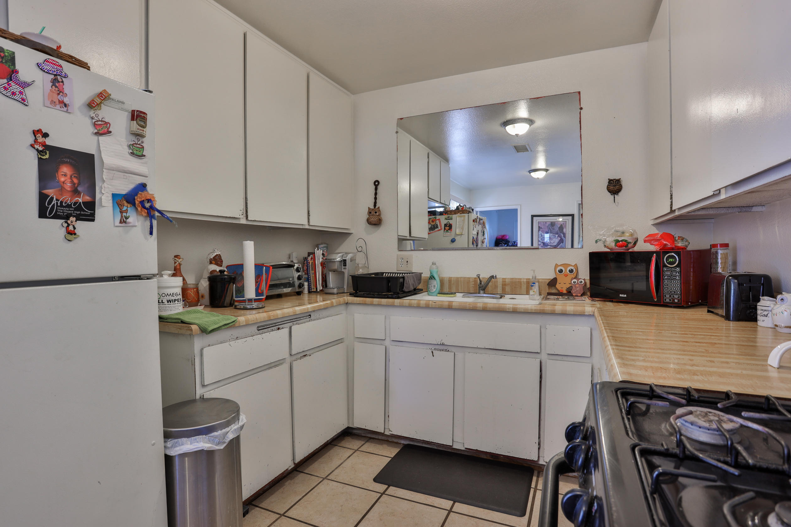 464 Riverside Avenue Rialto, CA 92376 - Photo 10 of 33 a kitchen with a sink and cabinets