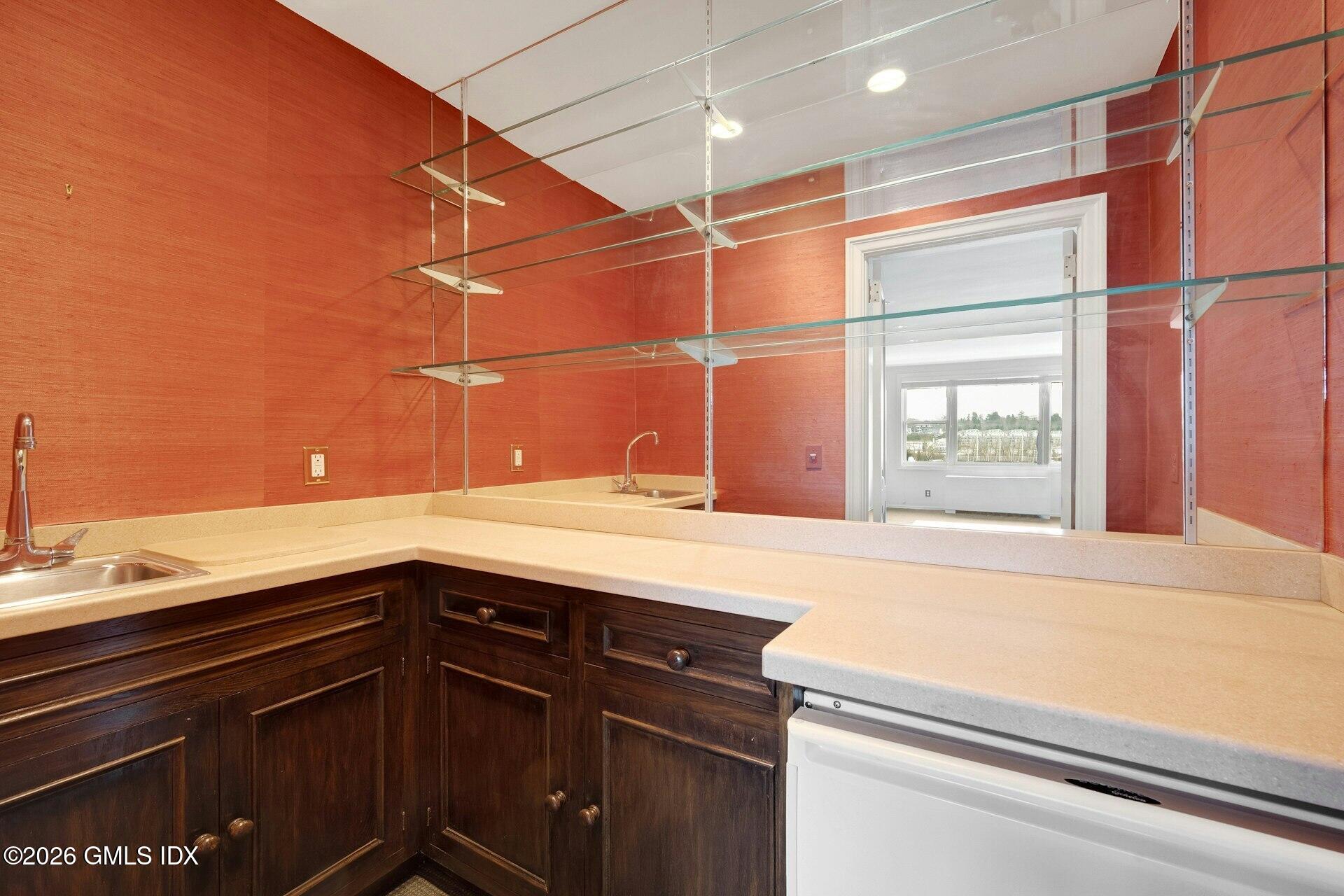 630 Steamboat Road, Unit 4AN Greenwich, CT 06830 - Photo 18 of 32 a bathroom with a sink and a window