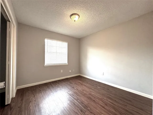 a kitchen with a sink a stove and refrigerator