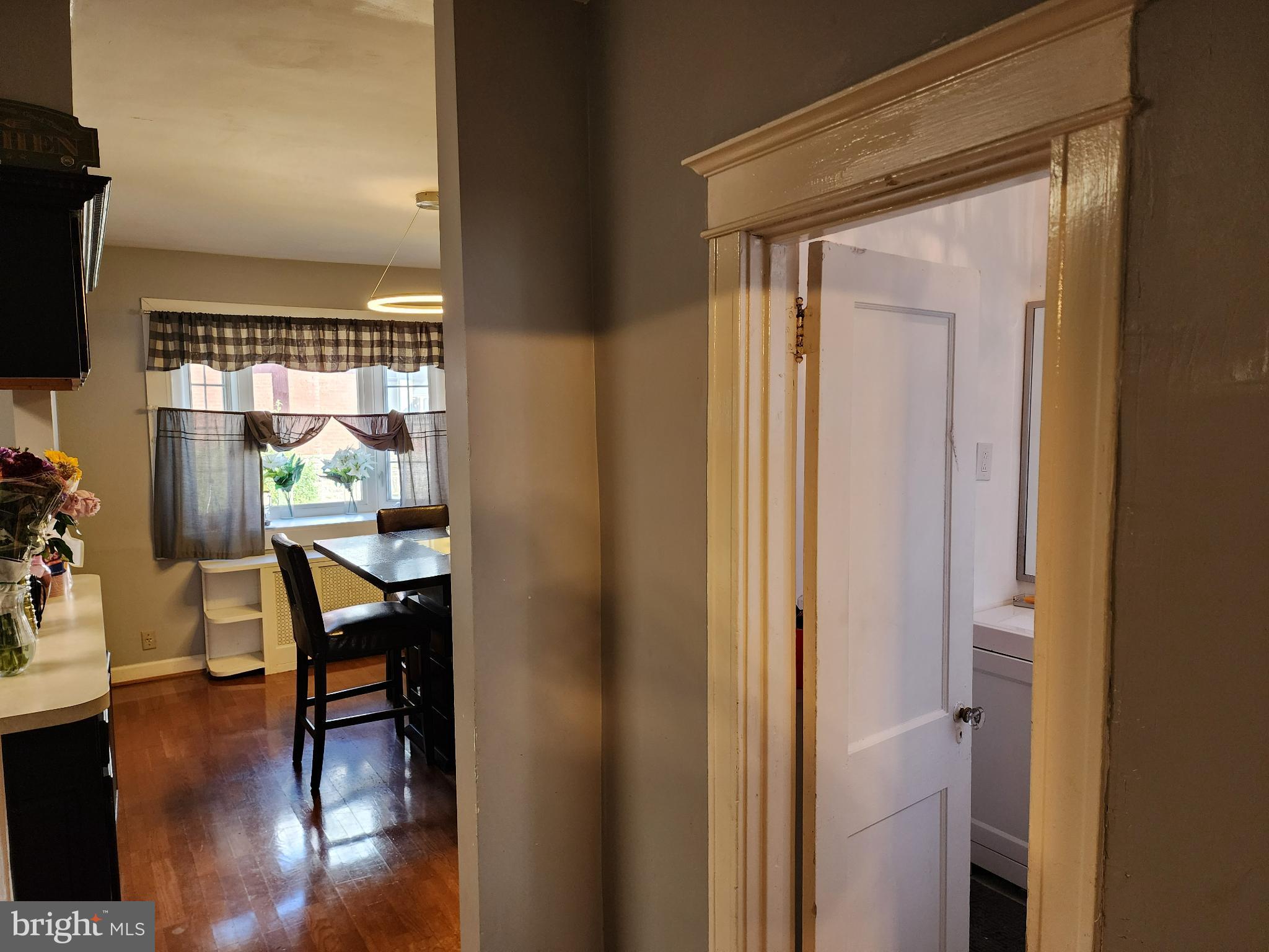 1729 68th Avenue Philadelphia, PA 19126 - Photo 17 of 38 a view of a hallway with dining area wooden floor and a table