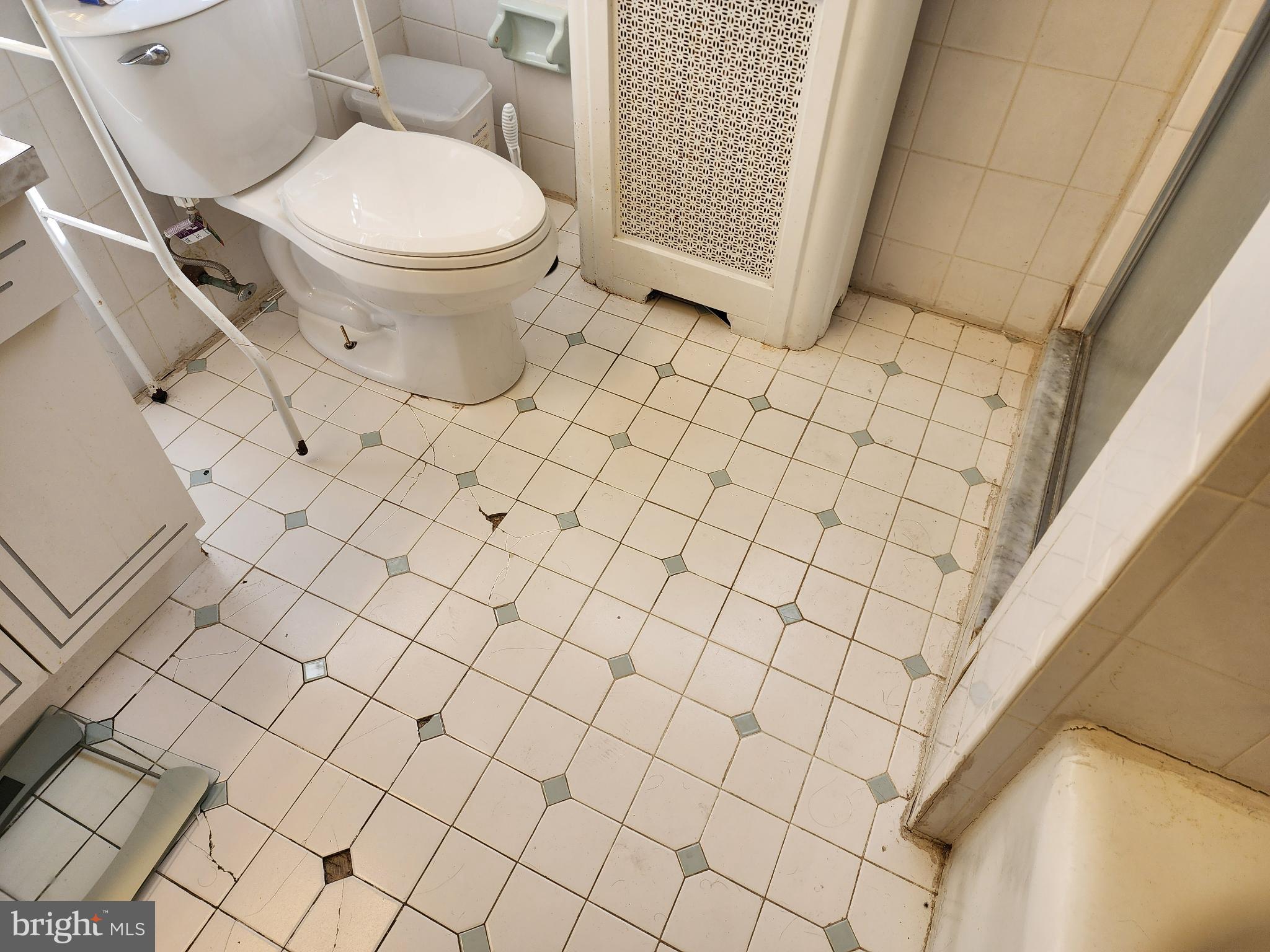 1729 68th Avenue Philadelphia, PA 19126 - Photo 30 of 38 a white toilet sitting next to a white wall