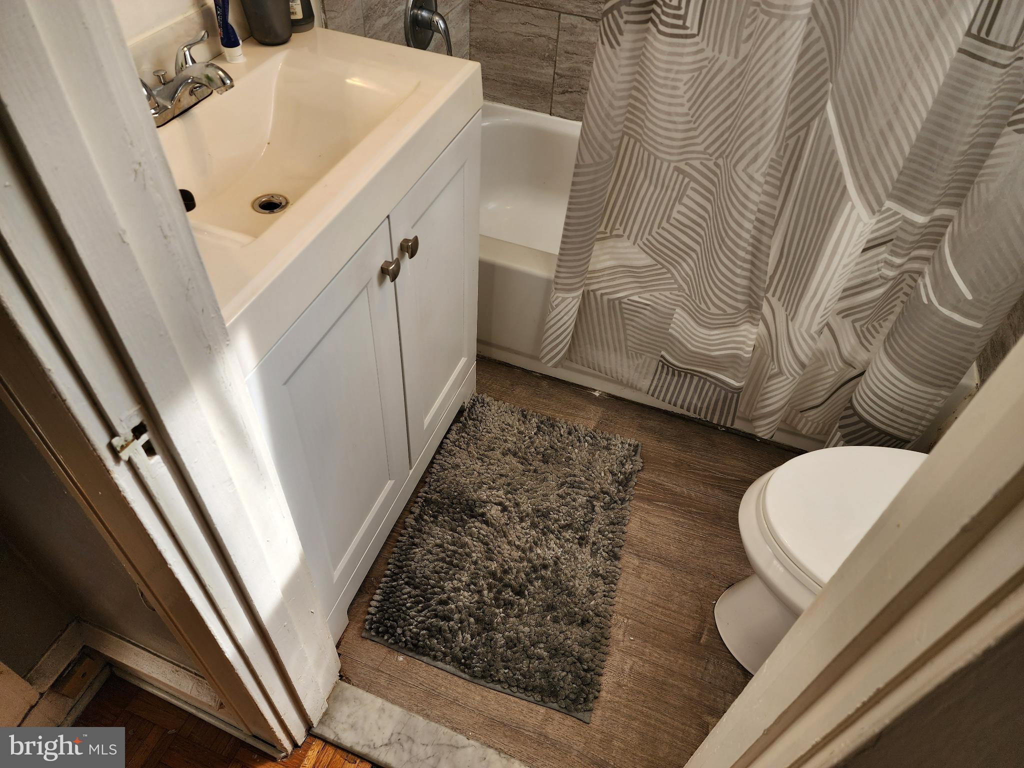 1729 68th Avenue Philadelphia, PA 19126 - Photo 34 of 38 a bathroom with a sink and toilet