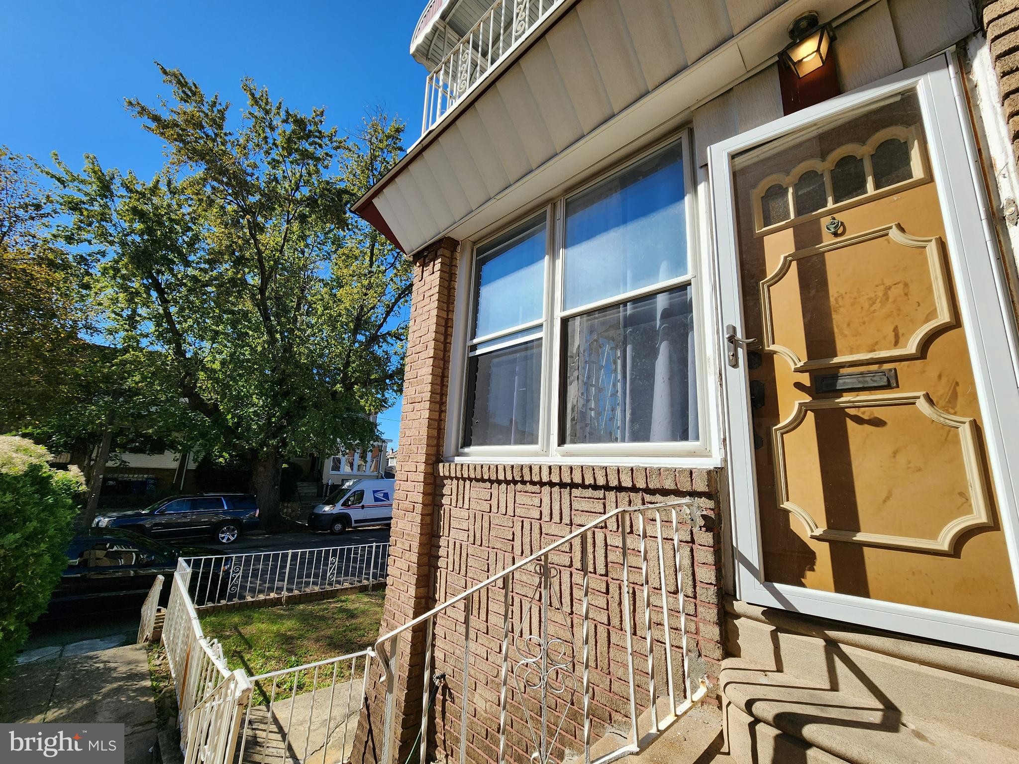 1729 68th Avenue Philadelphia, PA 19126 - Photo 6 of 38 a view of a balcony with furniture and iron fence