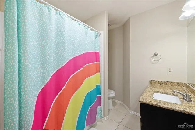 a view of a bathroom with tub and sink