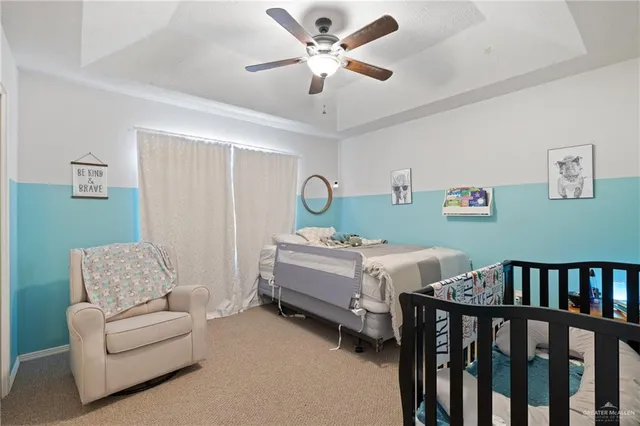 a bed room with furniture and a window