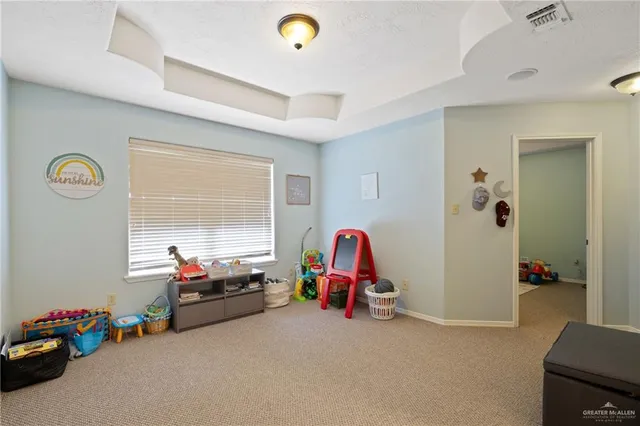 a view of a room with toys and a window