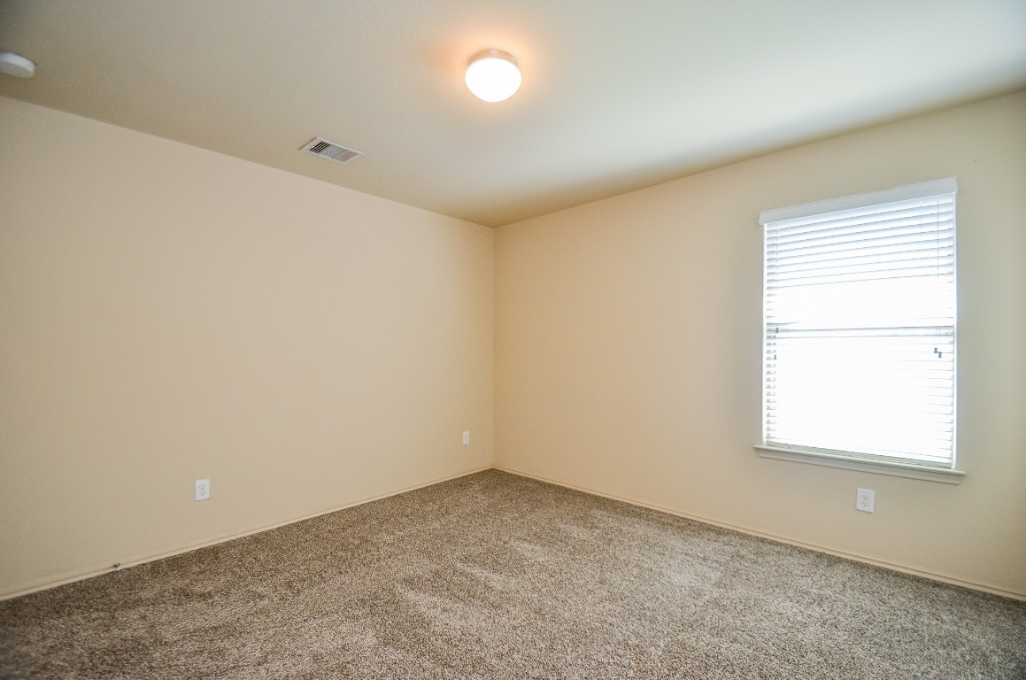 20114 Louetta Ash Drive Spring, TX 77388 - Photo 16 of 32 an empty room with a window