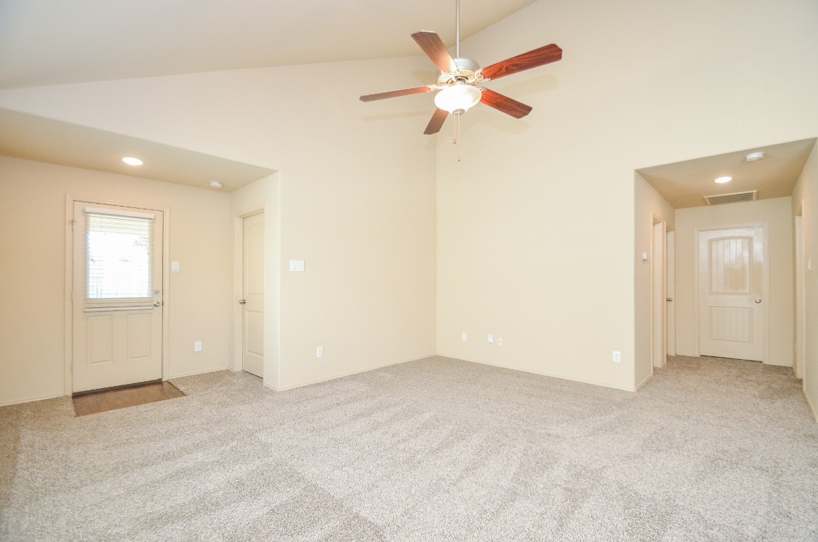 20114 Louetta Ash Drive Spring, TX 77388 - Photo 6 of 32 an empty room with a ceiling fan and a window