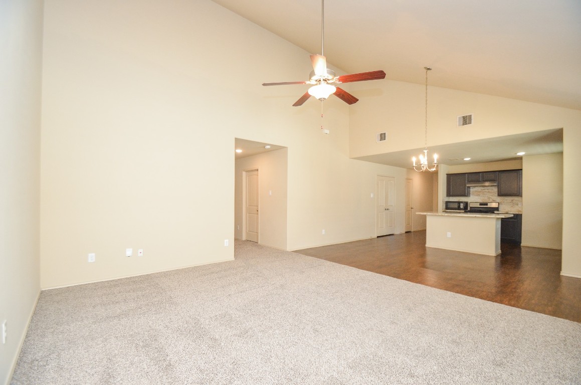 20114 Louetta Ash Drive Spring, TX 77388 - Photo 7 of 32 a view of a kitchen with a sink and a refrigerator
