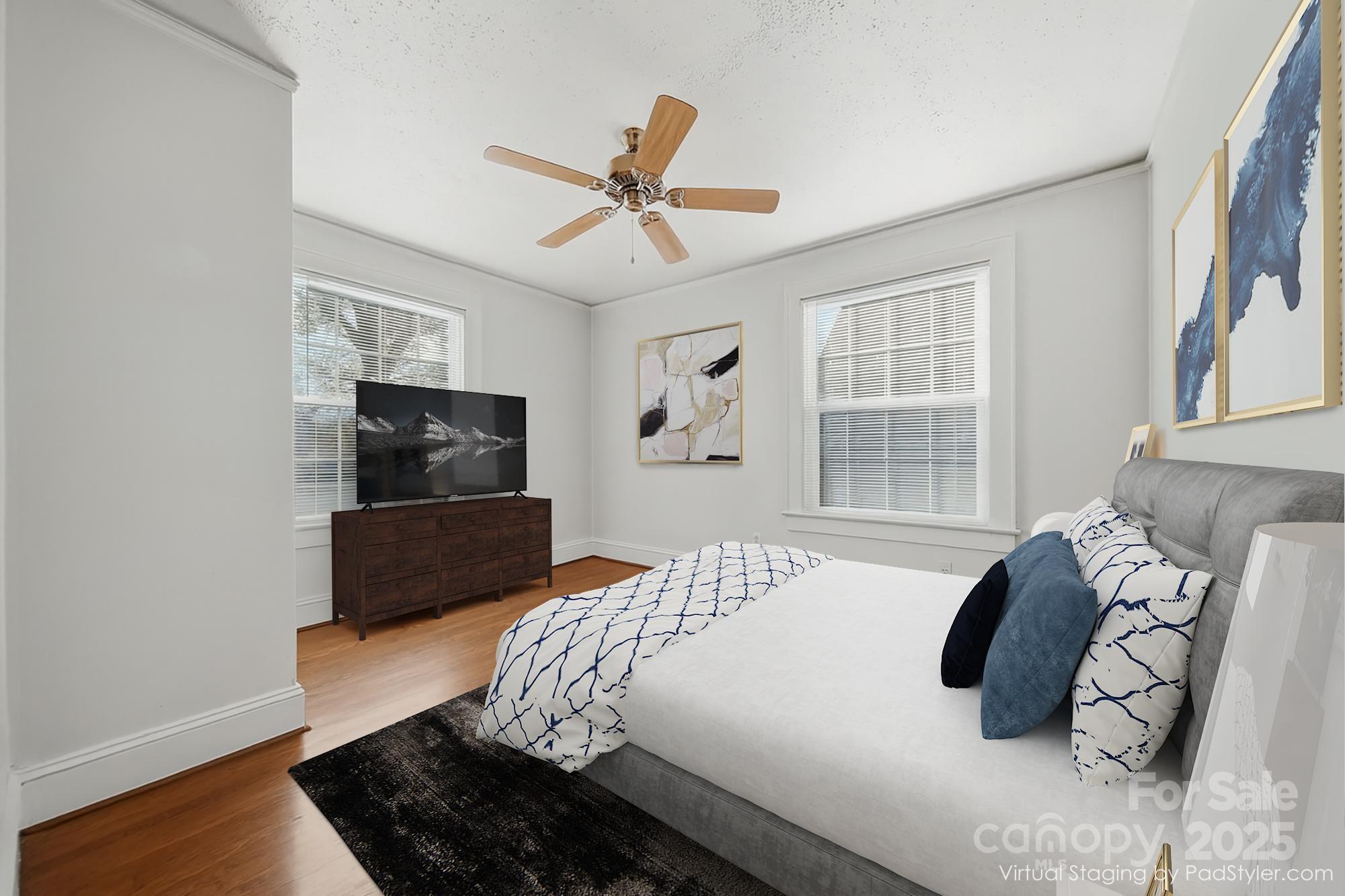 323 4th St Place Southwest Hickory, NC 28602 - Photo 14 of 32 a bedroom with a bed and a television